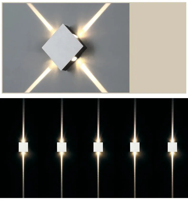 Modern square aluminium and iron LED wall light with warm white glow on a wall