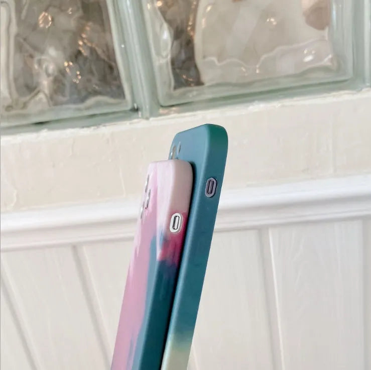 Soft silicone iPhone case with abstract gradient geometric oil painting design in blue green pink purple colours