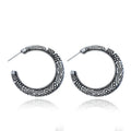 Bronze coloured C-shaped alloy earrings with vintage engraving pattern detail