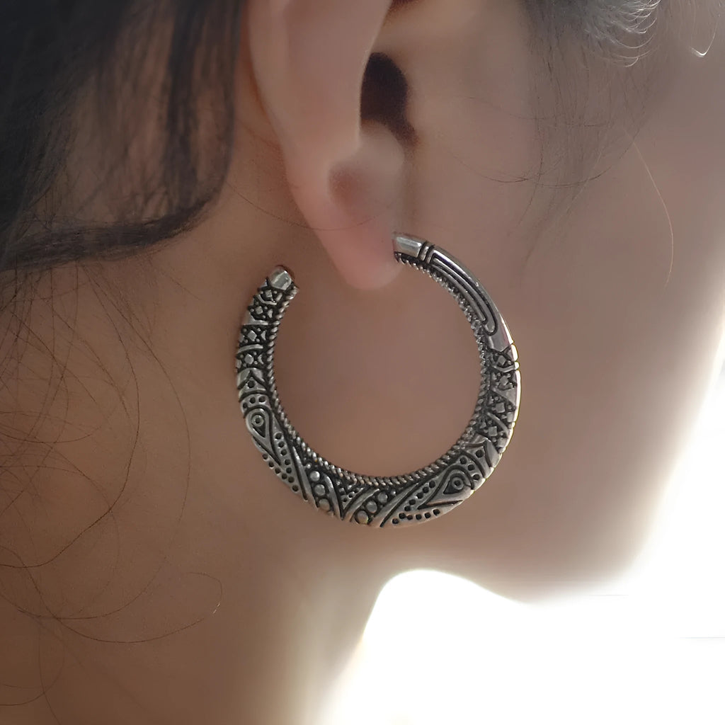 Bronze coloured C-shaped alloy earrings with vintage engraving pattern detail