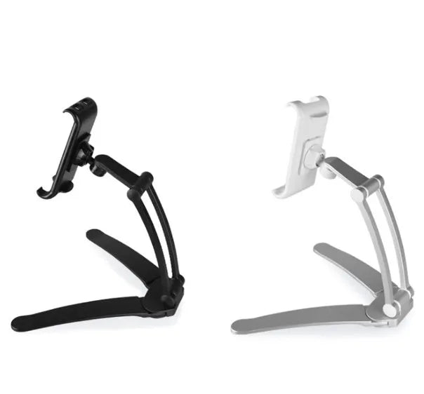 Silver aluminum desktop tablet stand with white ABS base, showing adjustable clip holding a tablet.