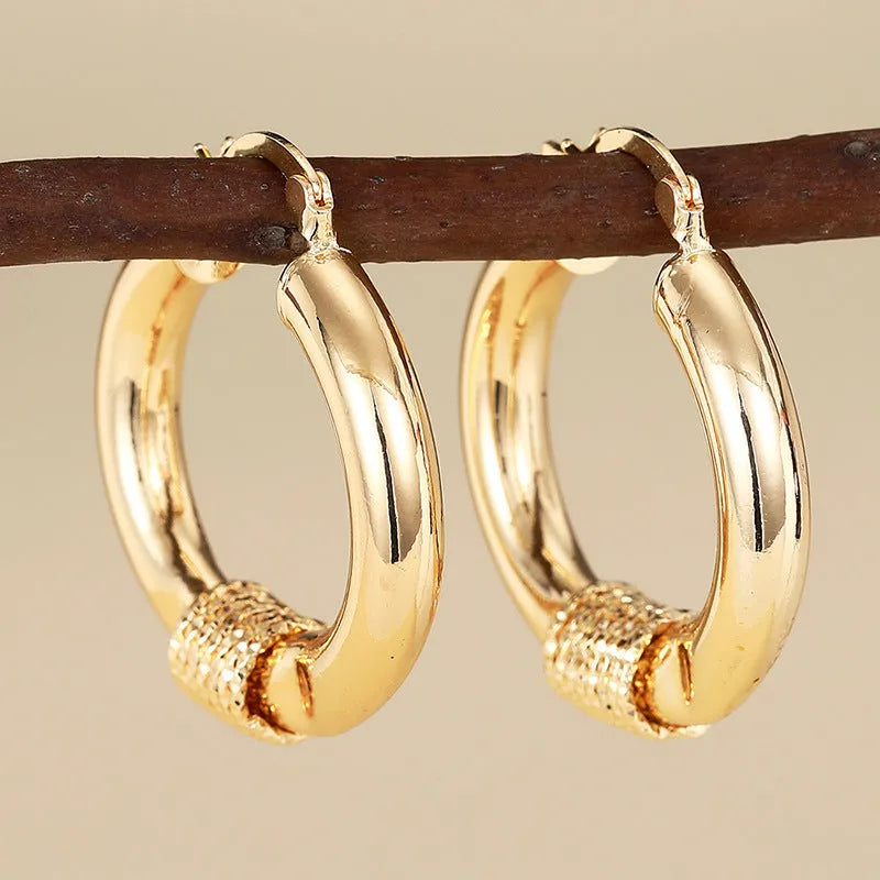 Geometric copper earrings for women with ring and line design in golden finish