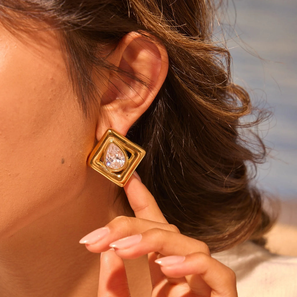 Gold geometric stud earrings with inlaid water drop zircon stones on stainless steel
