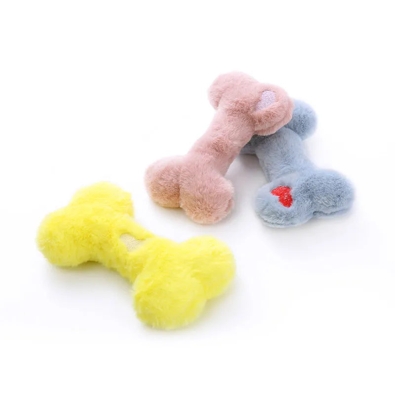 Blue plush love bone dog toy with squeaker for bite-resistant interactive play.