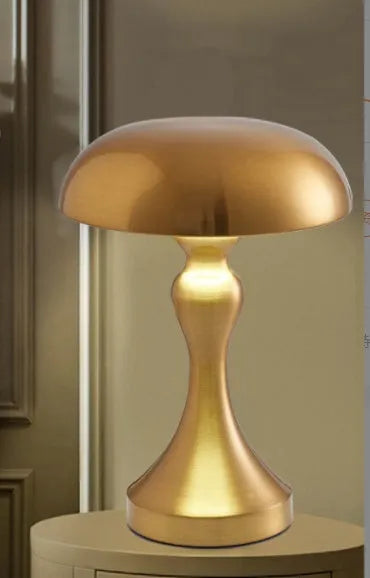 Metallic USB-charging LED desk lamp with touch control for white, warm, and natural light.