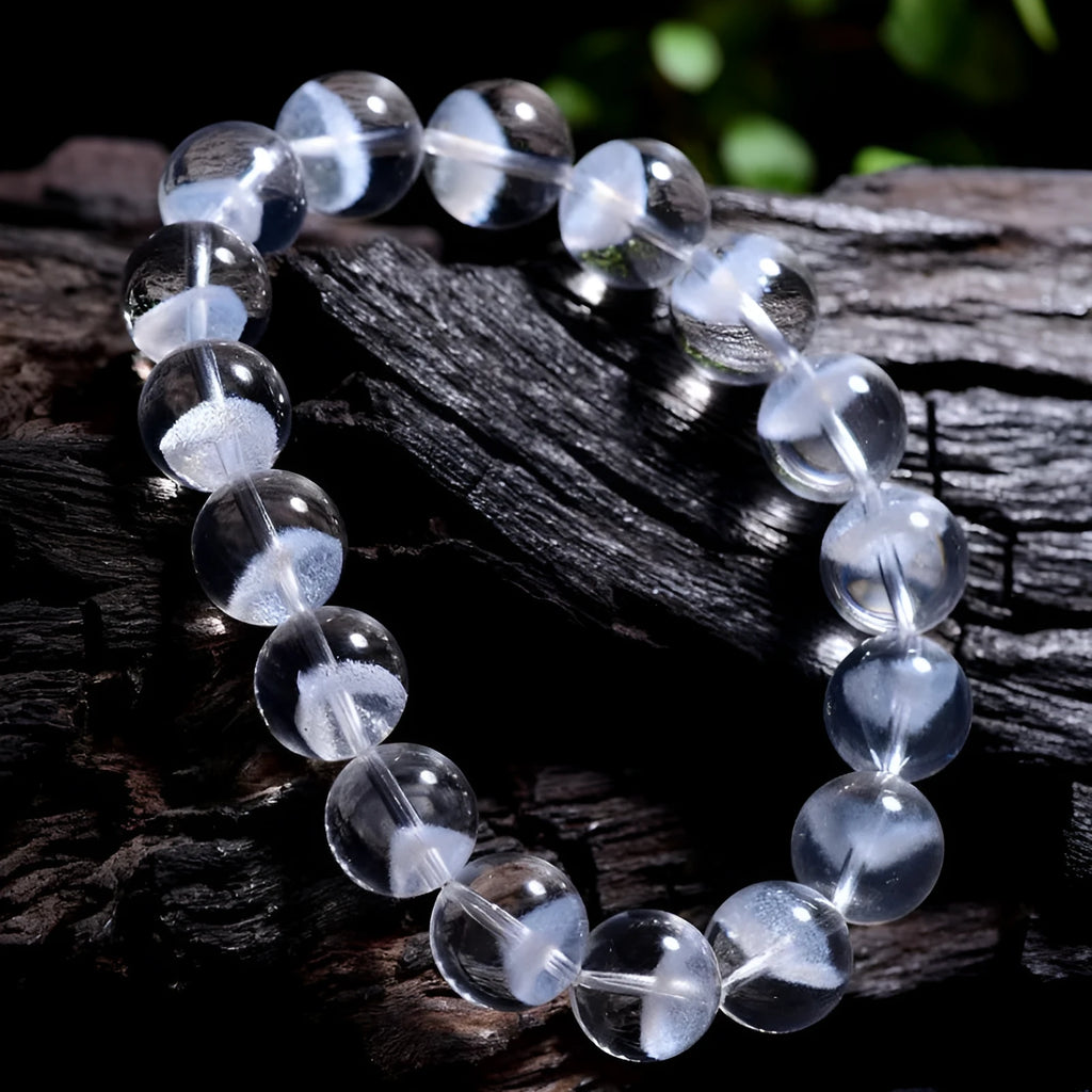 Women's white crystal pyramid ghost bracelet with Ruyi charm showing multiple bead size options