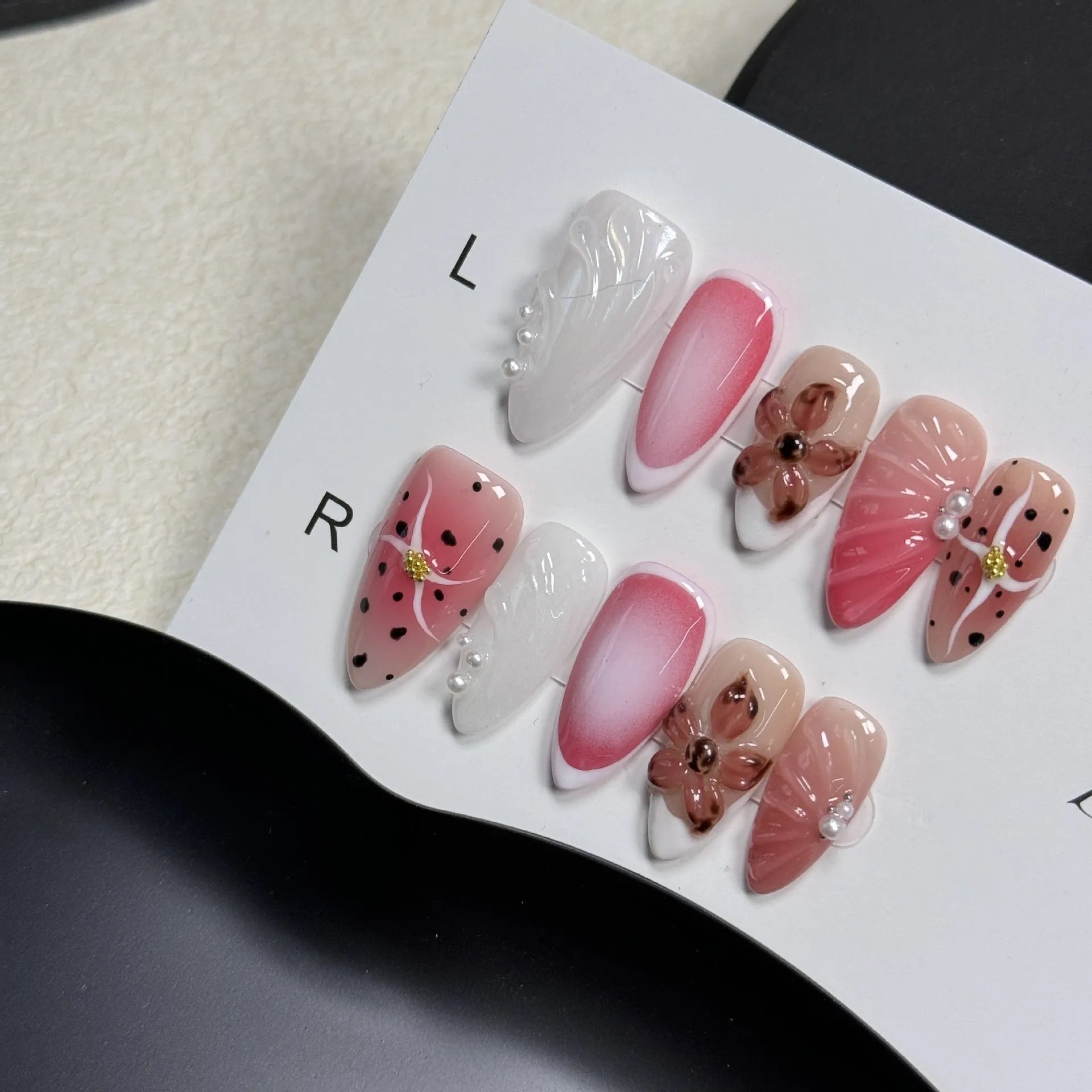 Hand-painted 3D carved nail art patches showing embossed cute patterns in four different sizes