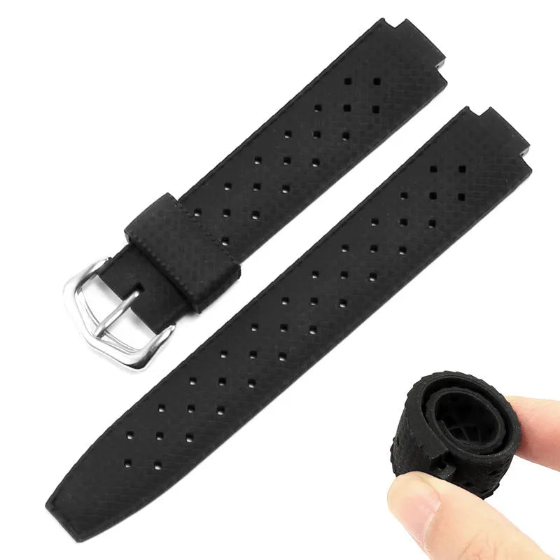 Black silicone watch strap with raised mouth and silver buckle, fitting 20-22mm lugs