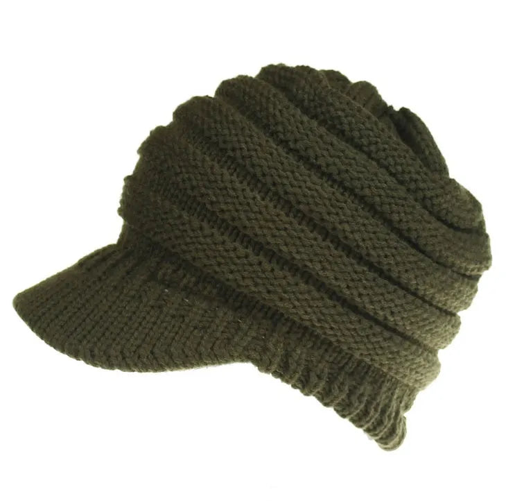 Women's thick knit ponytail beanie in acrylic yarn showing hairstyle accommodation