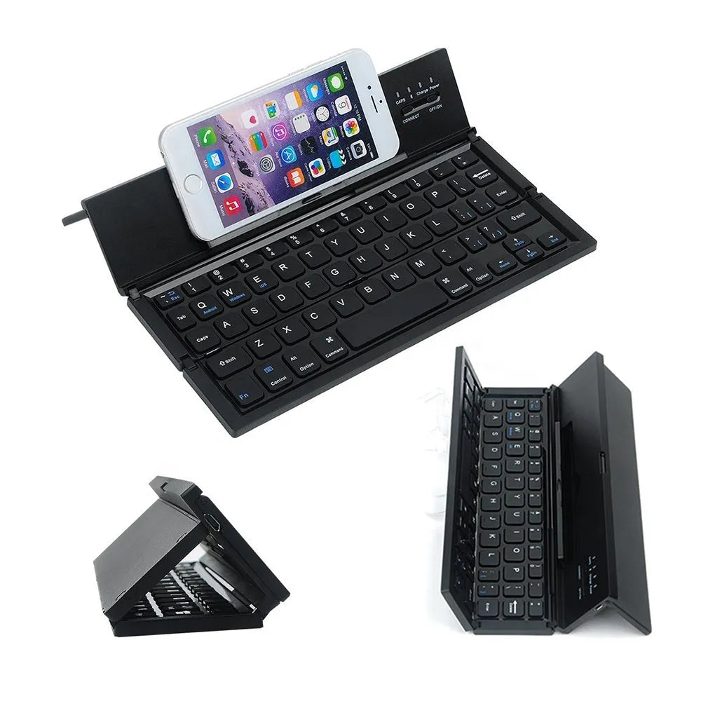 Black and white views of a folded mini wireless Bluetooth keyboard for tablets next to a smartphone.