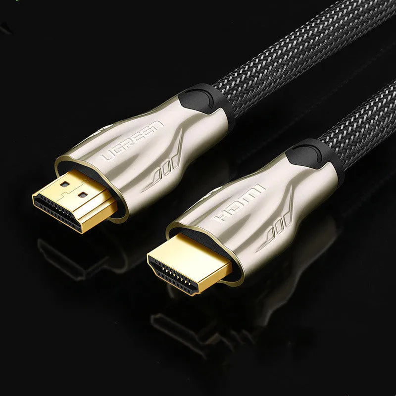A 5-metre long black HDMI cable with gold-plated connectors, coiled on a white background.