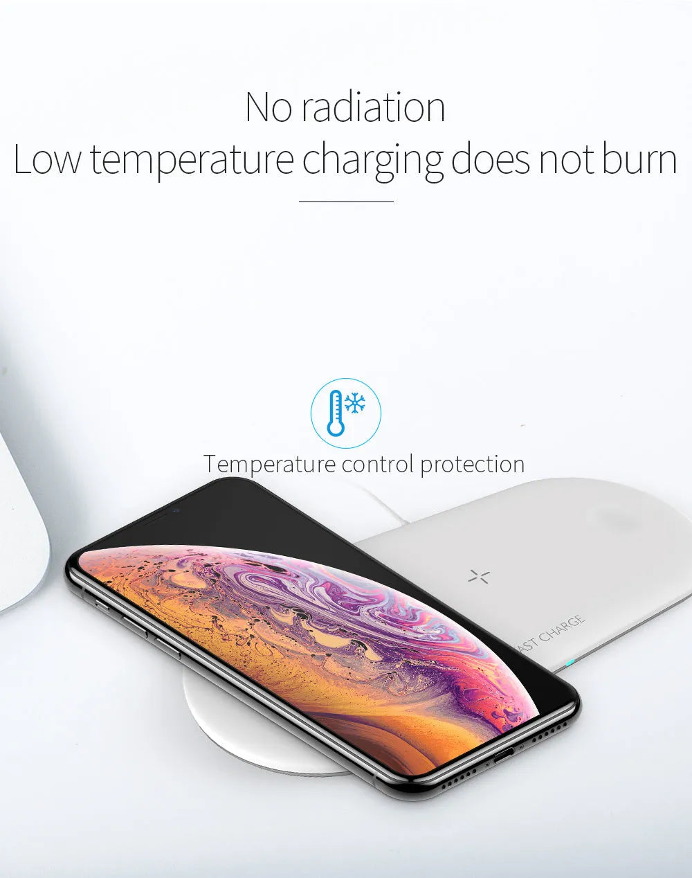 Black and white 3-in-1 wireless charging station for Apple Watch, iPhone and compatible earbuds on a desk.