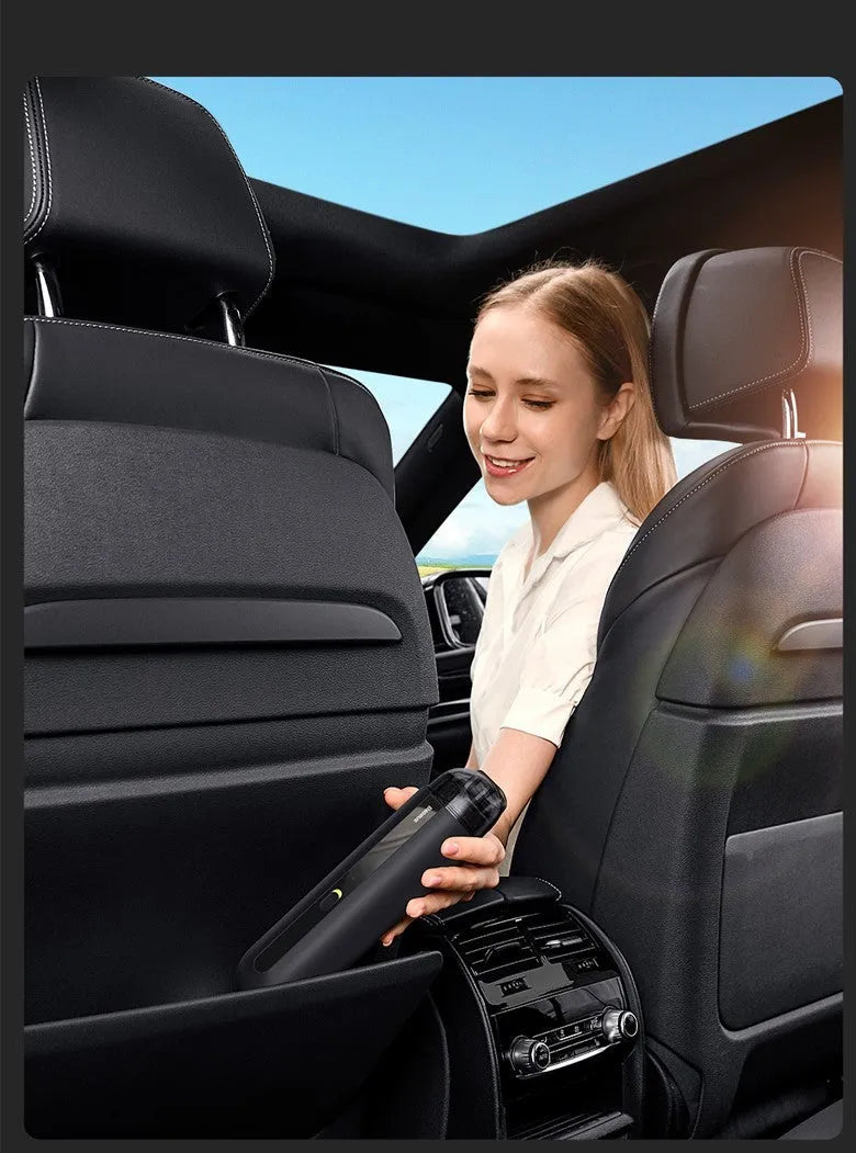 Baseus handheld cordless car vacuum cleaner in black, white, or green with suction and blow functions.