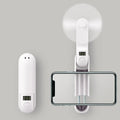Green folding mini USB fan with plastic blades in open position