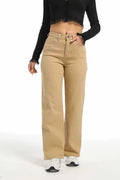 Women's high waist wide leg jeans in apricot colour on a hanger.