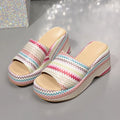 Colourful wave print women's wedge sandals with a fish mouth toe and thick rubber sole.