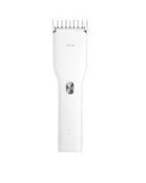 Black and white cordless hair clipper with adjustable comb and ceramic cutter head on a plain background