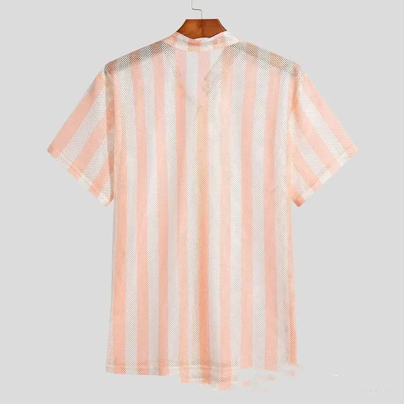 Men's pink loose-fit waffle-textured short-sleeve cardigan shirt on a hanger.