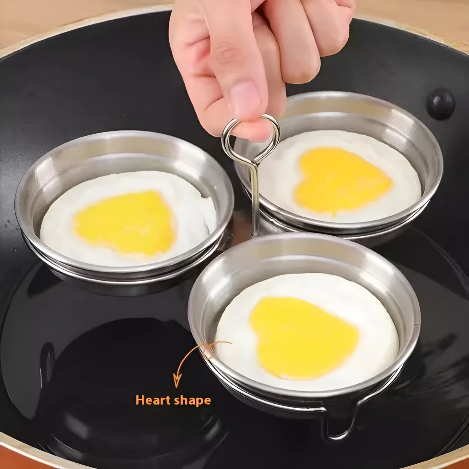 Mini heart-shaped and round egg steamer made from stainless steel for boiling eggs.