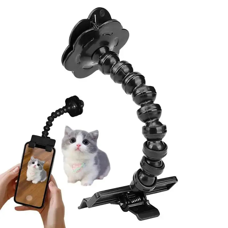 Pet photography selfie stick with clip for snacks in black plastic, showing phone holder and rotatable head