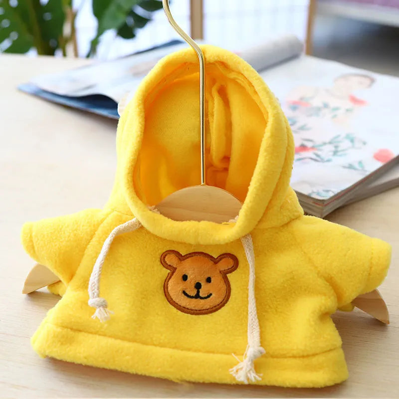 A blue cloth dog hoodie on a mannequin, shown with a separate hood, representing the medium or large size pet sweater.