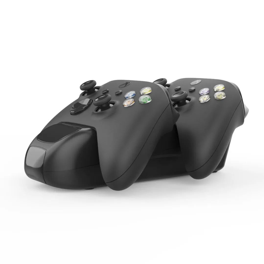Black Xbox Series X controller charging dock with two controllers on charging station showing LED indicators