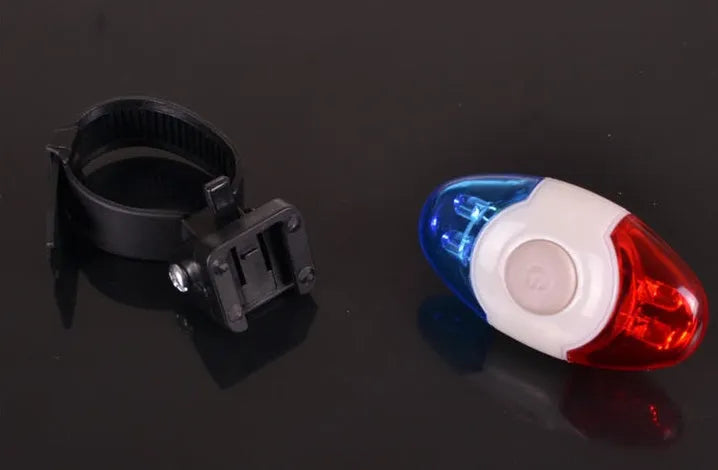 Red and blue dual-colour bicycle tail light with four LED beads on an adjustable mounting bracket.