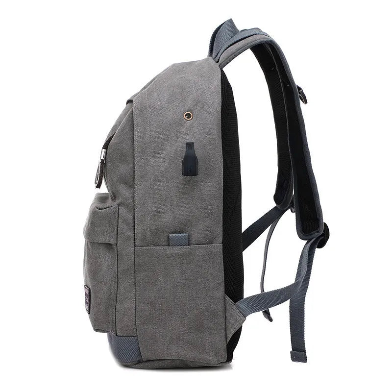 Canvas backpack with USB charging port in grey colour showing compartments