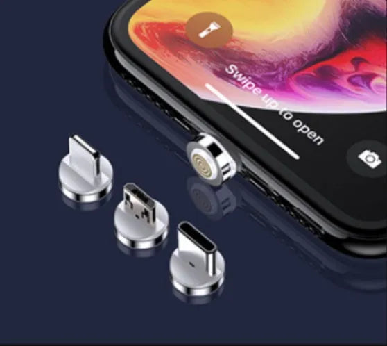 Black magnetic data cable with USB-C connector and side LED light, laid flat next to its aluminium foil packaging.
