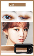 Dual-color shimmer eyeshadow compact with two coordinated powder shades in a small black case