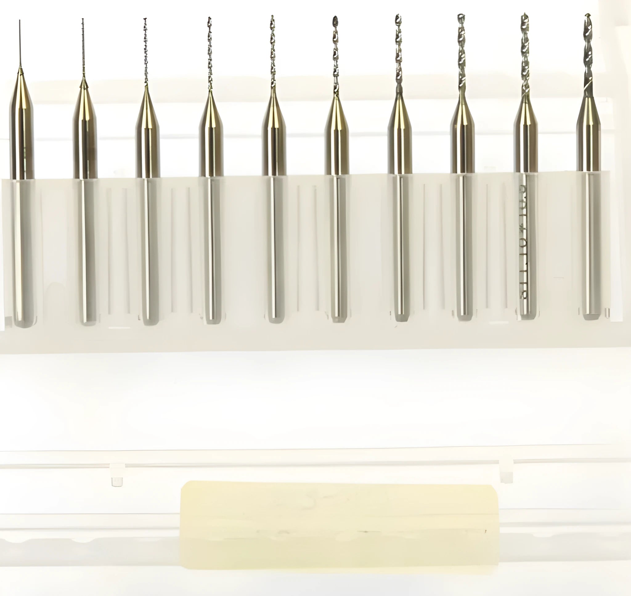 Close-up of imported tungsten carbide micro-engraving bits for precision circuit board and electronics work.