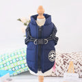 Red waterproof dog coat with harness access opening for winter weather protection