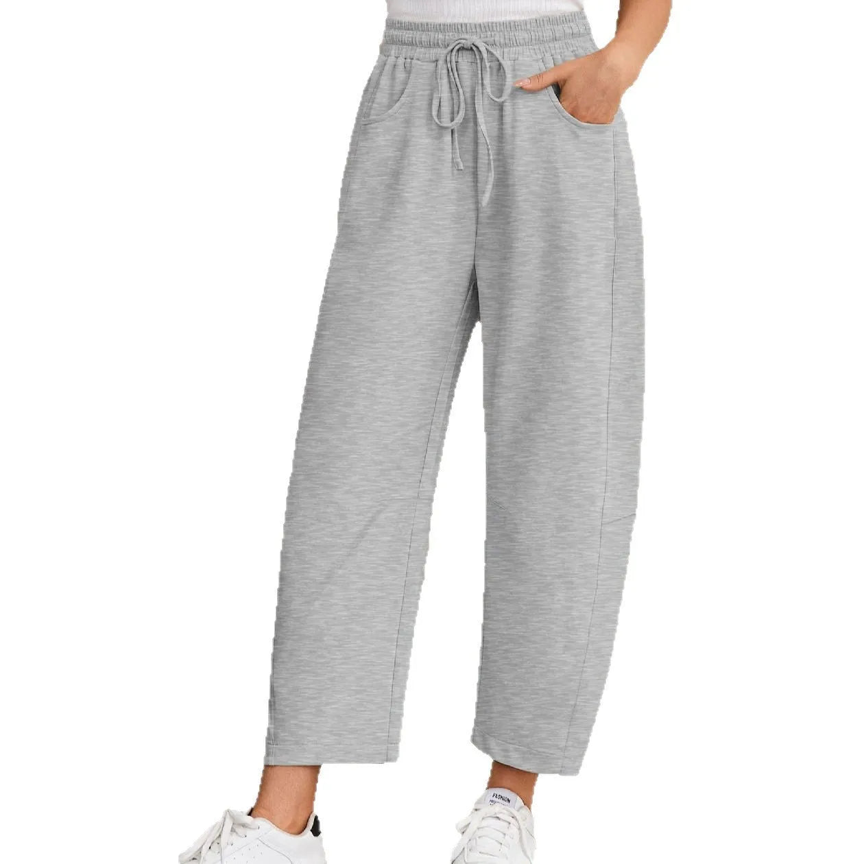 Loose cropped sweatpants with elastic drawstring waist and side pockets in apricot colour