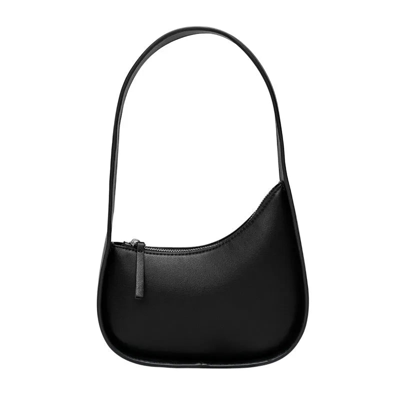 Genuine leather ladies shoulder bag in half moon shape with wide strap