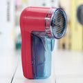 Portable electric lint remover device for clothing and sweaters with compact handheld design