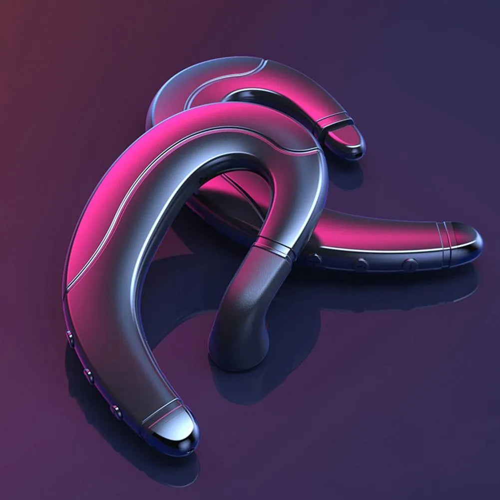 Black Bluetooth single-ear headset mounted behind the ear for driving.