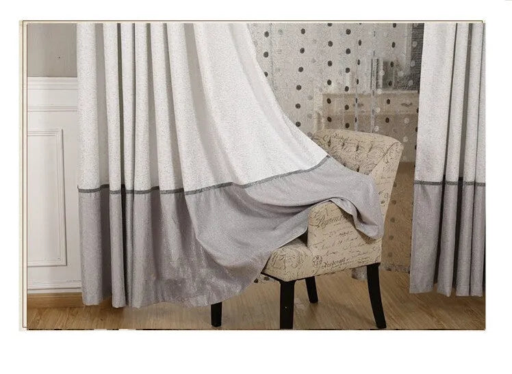 Simple blackout curtain panel showing light-blocking fabric with hook hanging option