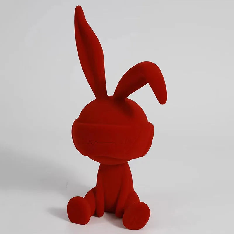 Resin suede blindfold rabbit table ornament in blue, green, and red colour options