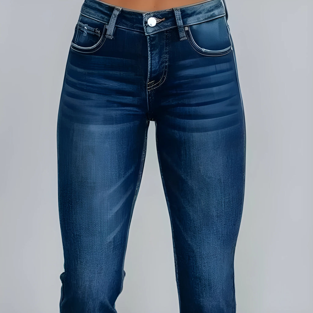 Women's casual denim jeans in solid dark blue with a hand-worn distressed finish.