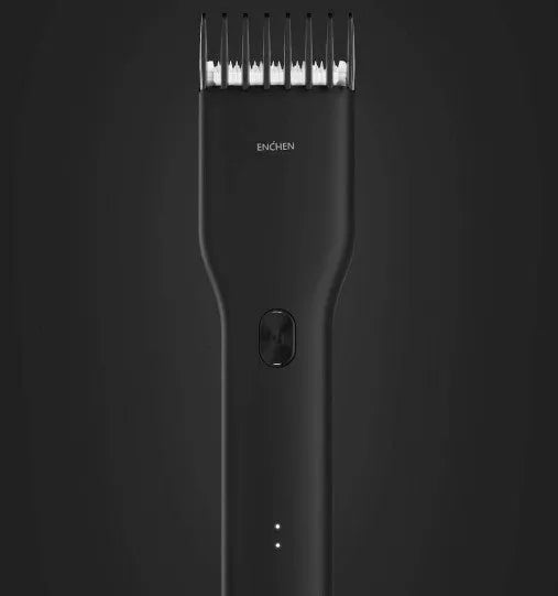 Black and white cordless hair clipper with adjustable comb and ceramic cutter head on a plain background
