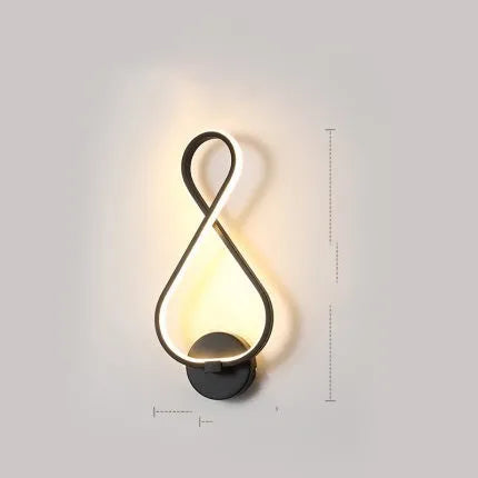 Nordic minimalist LED wall lamp with silicone shade for bedside use, black finish
