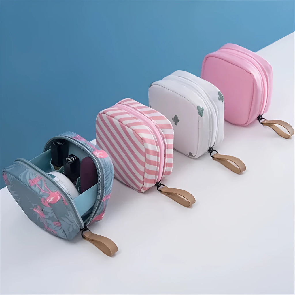 Cloth makeup storage bag with a cube shape and plain pattern, shown in blue colour.