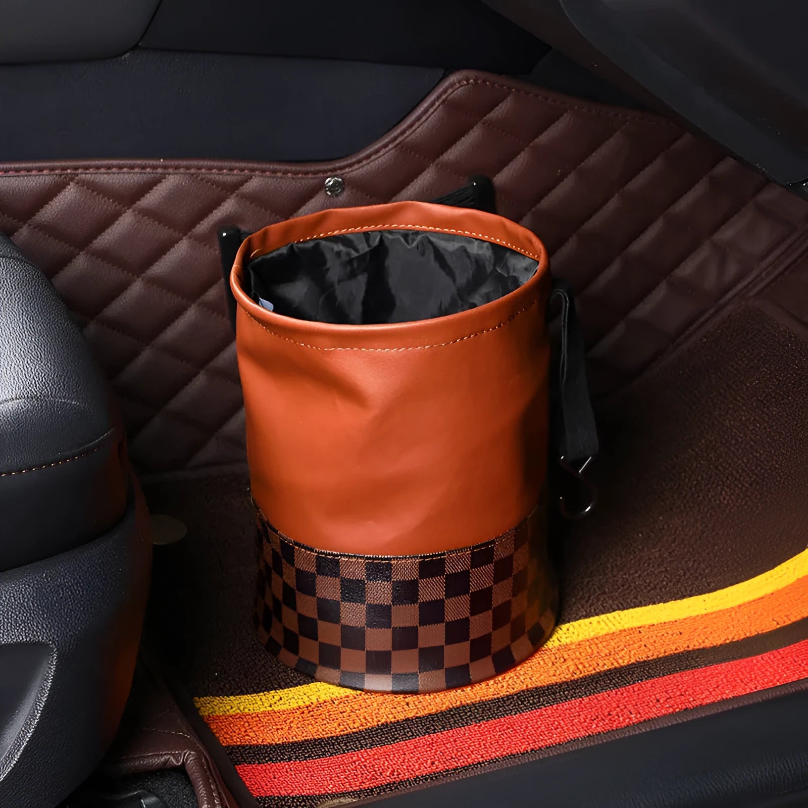 Leather retractable car trash can shown folded and unfolded, with waterproof construction and carrying handle