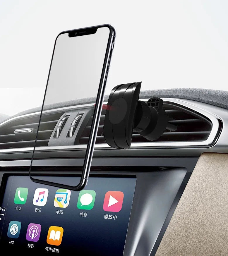 Black car air vent phone holder with magnetic smartphone attachment mounted on vehicle ventilation outlet