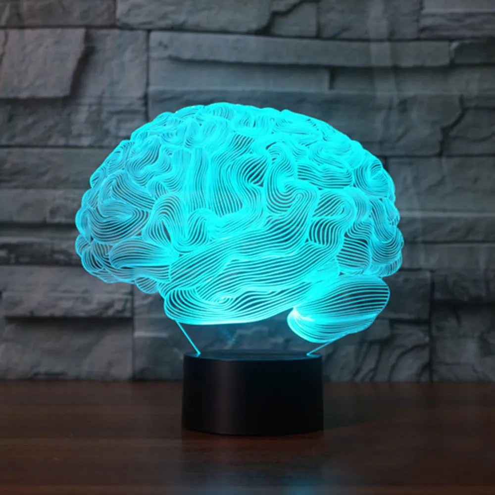 3D brain illusion LED desk lamp on stand with remote control, showing colourful light projection.