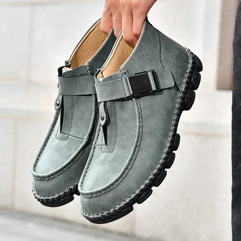 Handmade brown casual slip-on shoes with a flat heel and synthetic leather upper.