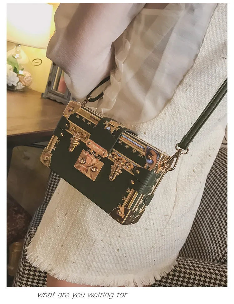 Women's hard PU shoulder bag with flap closure and rivet decoration in black or green