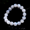 Natural blue moonlight moonstone round bead bracelet showing polished stone surface and blue sheen