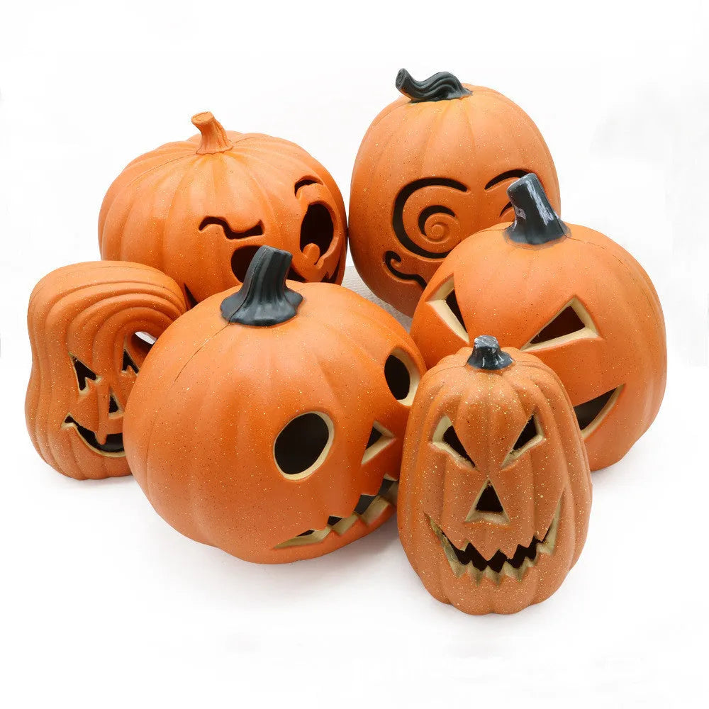 Halloween pumpkin lantern with scary hollow-out skull design in yellow resin, 23x19cm