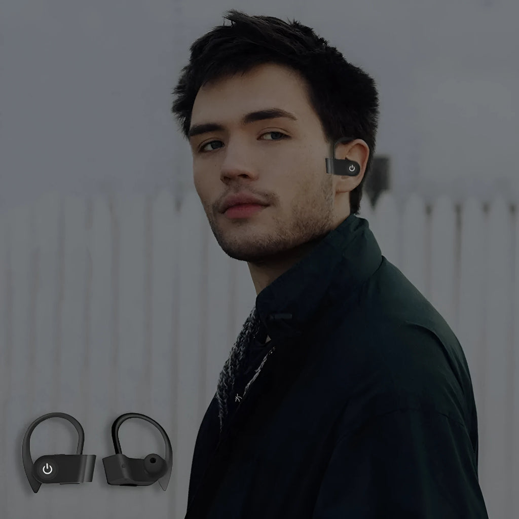 Black wireless Bluetooth earphones with ergonomic design shown on a grey background.